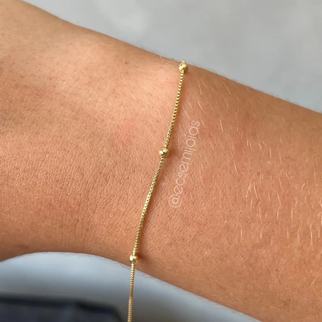 Pulseira veneziana com bolinhas pequenas lisas mais espaçadas -19cm - banhado a ouro 18k